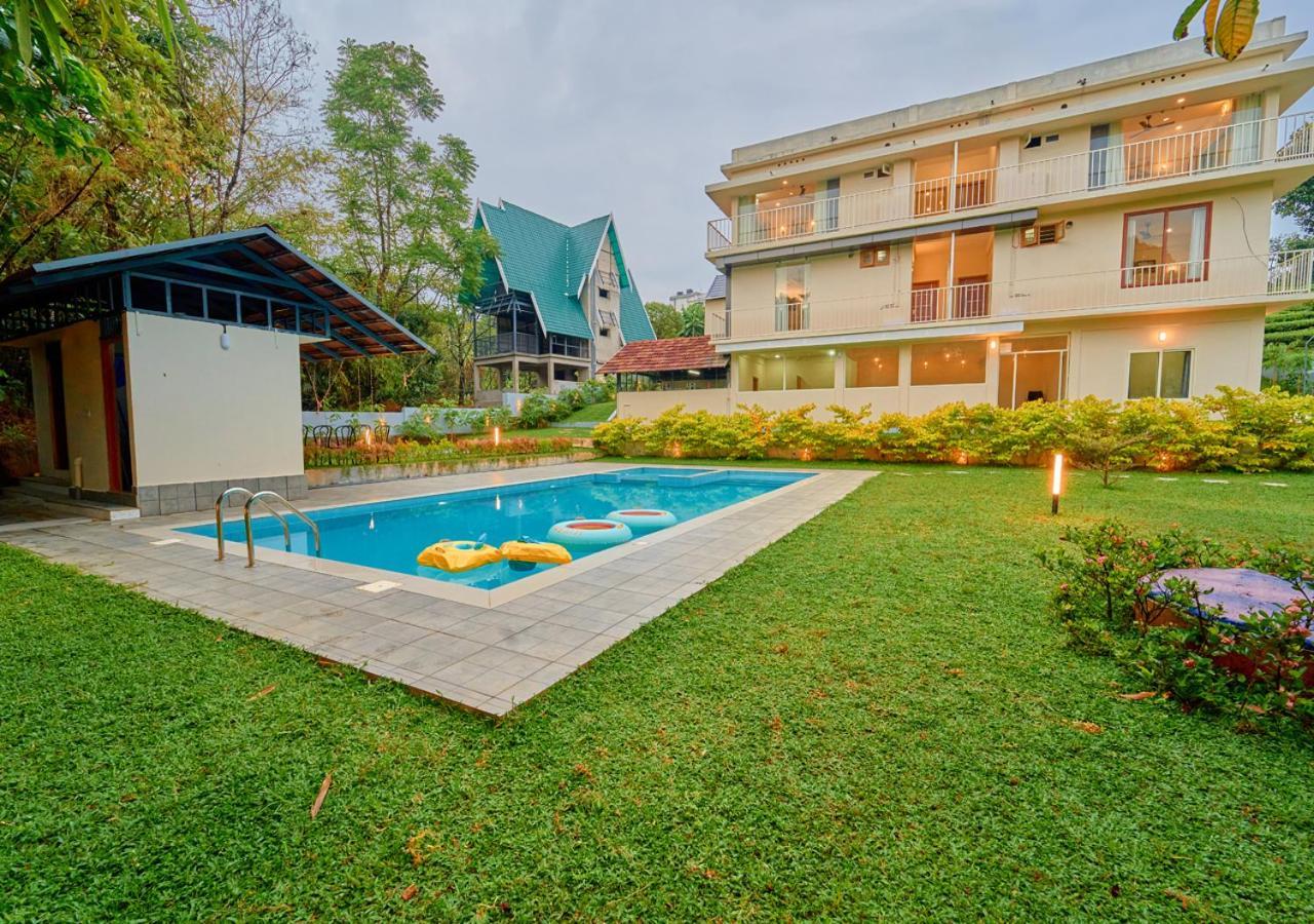 Glen Castle Vagamon Pool Resort By Voye Homes Buitenkant foto