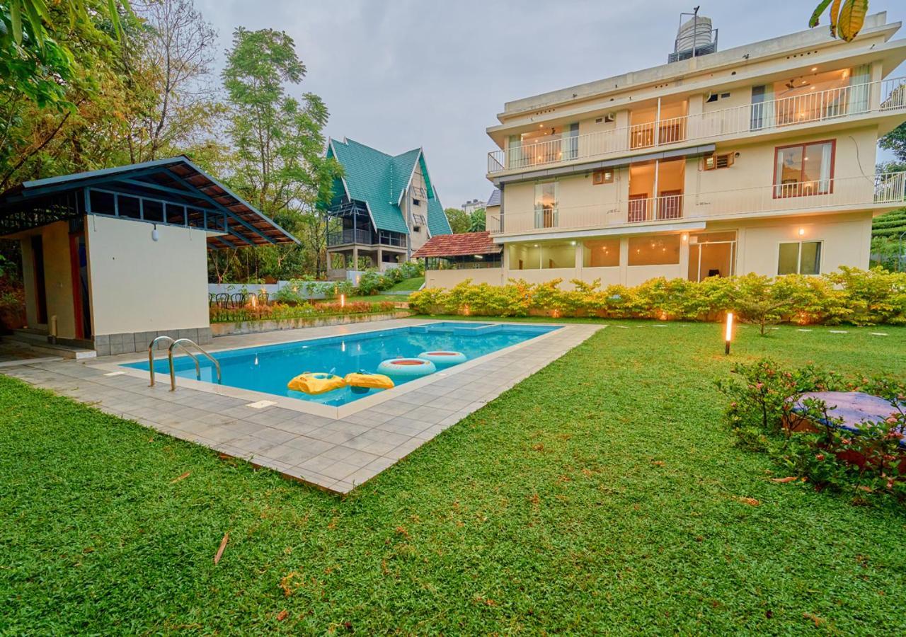Glen Castle Vagamon Pool Resort By Voye Homes Buitenkant foto