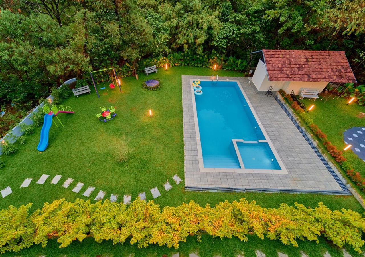 Glen Castle Vagamon Pool Resort By Voye Homes Buitenkant foto
