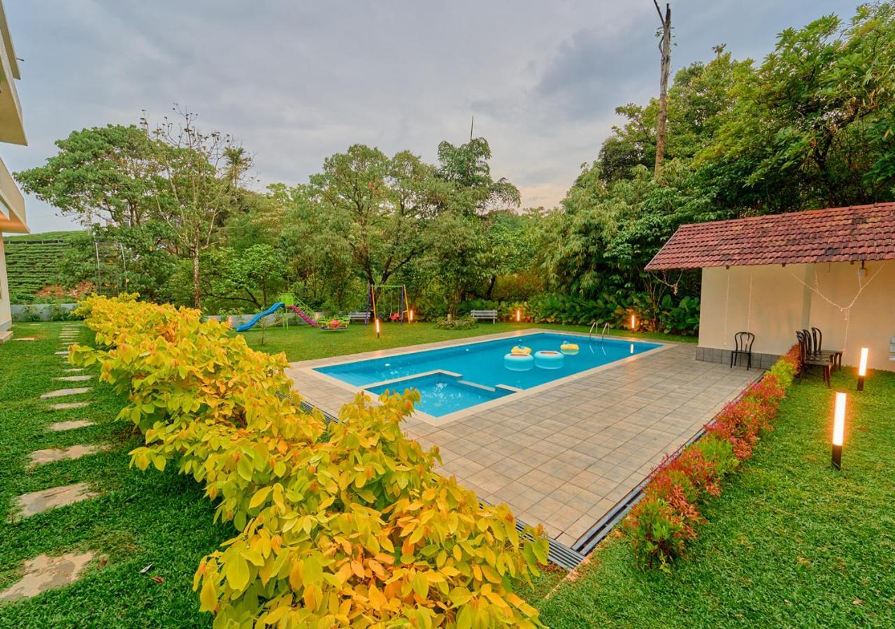 Glen Castle Vagamon Pool Resort By Voye Homes Buitenkant foto